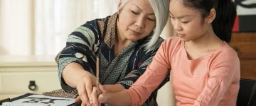 Woman with child coloring